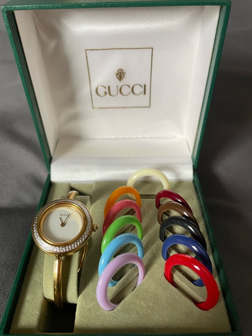Gucci Gold Women's Watch with Interchangeable Color Rings.